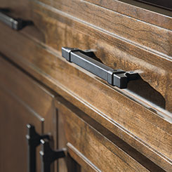 Close-up detail of cabinet pulls in an oil-rubbed bronze finish