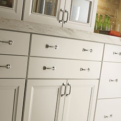 Close-up of Cayhill cabinet doors and drawers showing hardware positioning