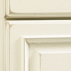 Close-up of cabinet door with vintage touch finishing technique applied