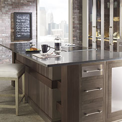 Torin Walnut kitchen cabinets with industrial-like metal accents