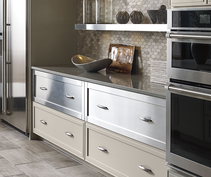 Close-up of Lyssa painted maple cabinets and stainless steel drawer fronts