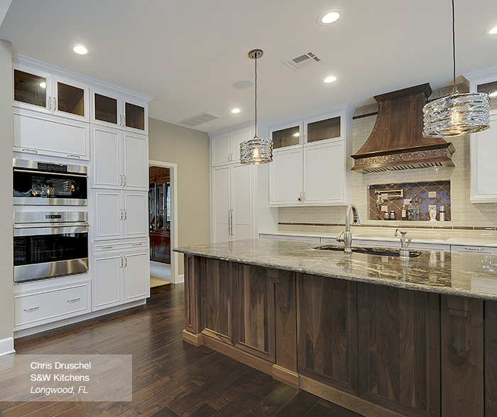 Riff kitchen cabinets in maple pure white with a walnut island in walnut natural